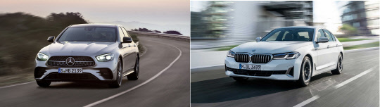 메르세데스-벤츠와 BMW가 수입차 판매 1위 자리를 놓고 초박빙 승부를 펼치고 있다. 사진은 메르세데스-벤츠 E클래스와 BMW 5시리즈. 각 사 제공